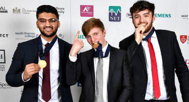 Three young winners of the Wordskills event showing their medals