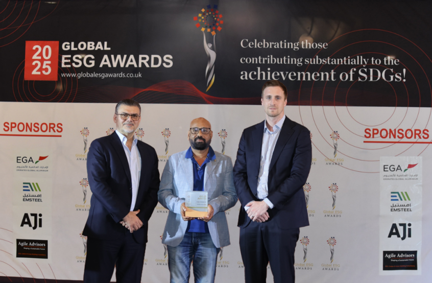 Three men accepting award with 2025 Global ESG Award